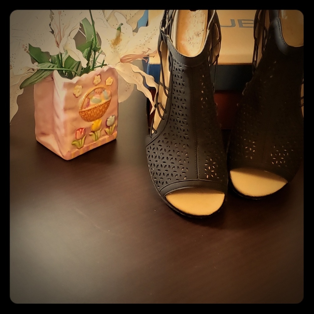 Peep toe vented open ankle bootie
